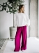 Lniane spodnie Natural Elegance w intensywnym różowym kolorze, szerokie nogawki i elastyczny pas Pracownia FIO